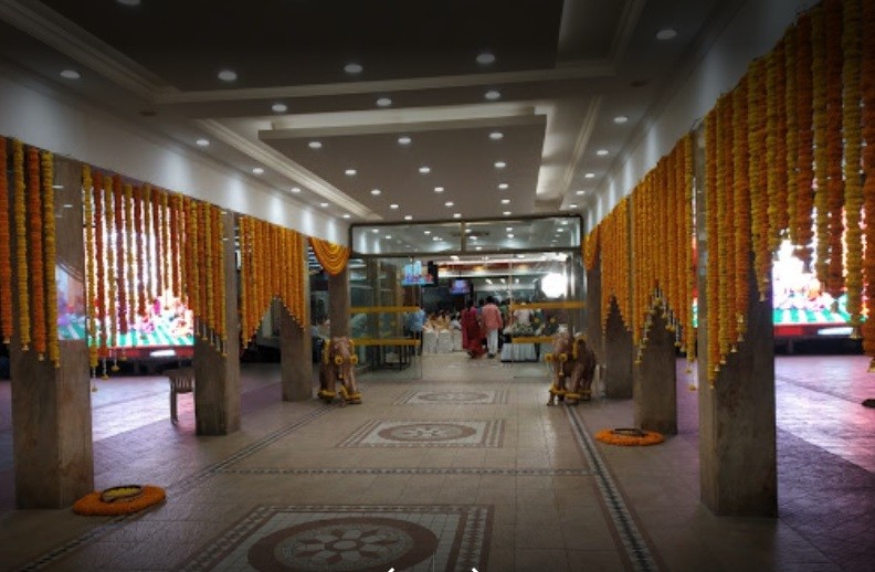 Grand approach corridor and entrance hall decorated with marigold garlands